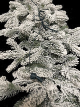 200 cm snowy Christmas garland with 324 tips and warm LED lights, perfect for festive home decor.
