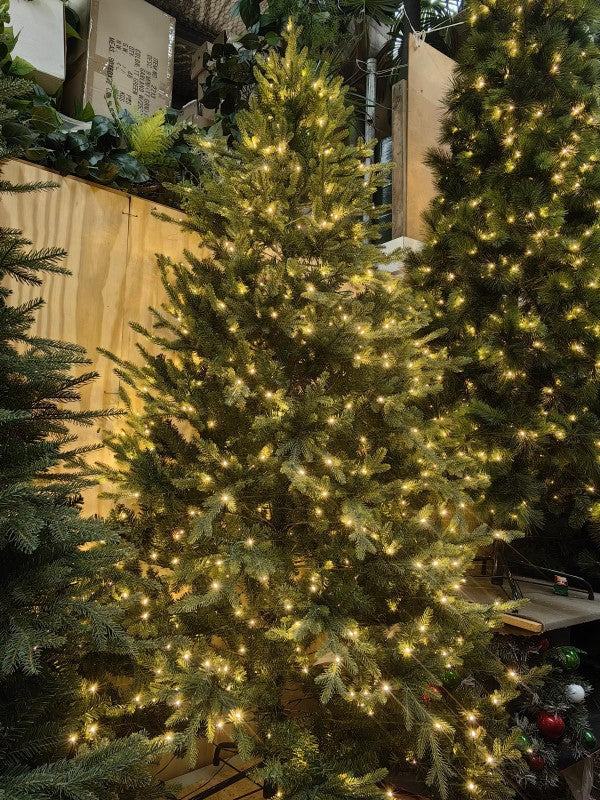 7.5' Mixed PE Pine Christmas tree with 3268 tips, perfect for festive decor and showcasing ornaments and lights.