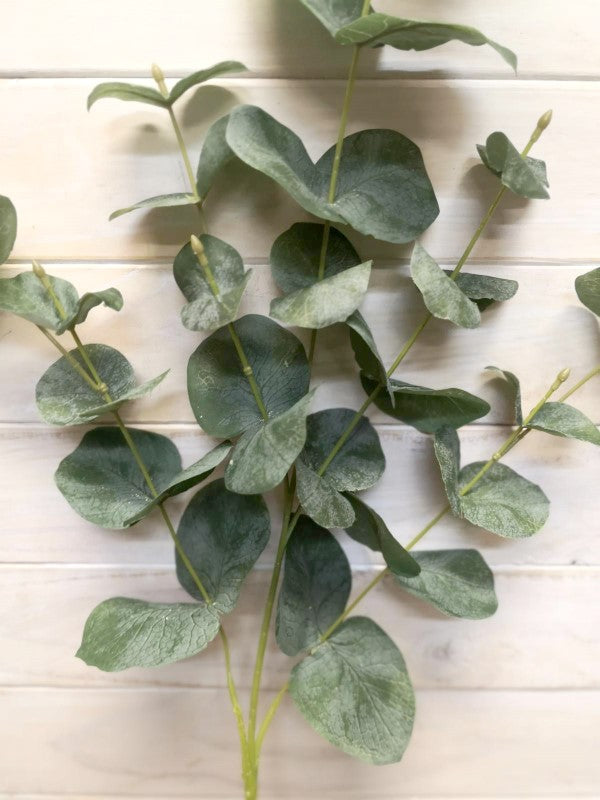 Lush large velvet eucalyptus spray featuring soft, rich-hued leaves, perfect for elegant home or office decor.