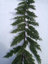 Realistic 180cm artificial juniper pine garland with seeds, perfect for year-round home decor and events.