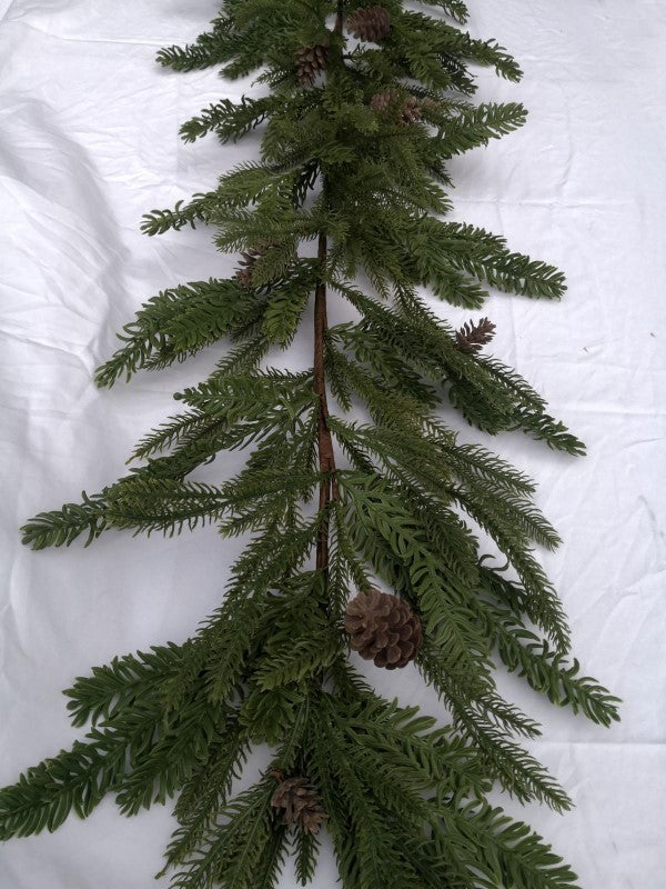Lush 180cm artificial mixed pine garland with realistic texture and pinecones, perfect for festive decor.