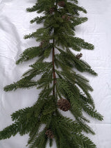 Lush 180cm artificial mixed pine garland with realistic texture and pinecones, perfect for festive decor.