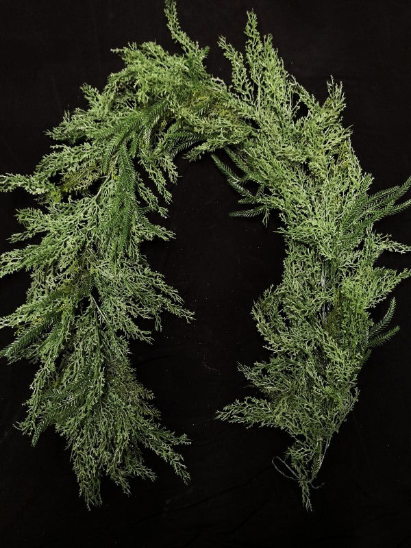Lush 200cm artificial garland of cedar, cypress, and pine, perfect for elegant home and event décor year-round.