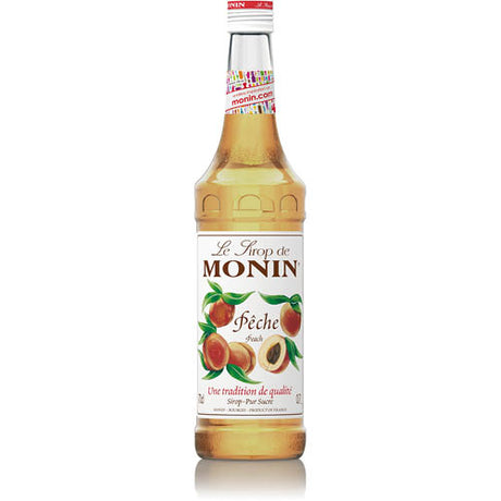 Monin Peach Syrup 700ml bottle, featuring natural peach flavors for cocktails, smoothies, and desserts. Perfect for summer drinks.