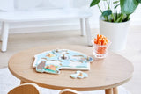 Wooden peg puzzle featuring 6 vibrant animal pieces and a cozy house-shaped frame, perfect for toddlers' fine motor skills.