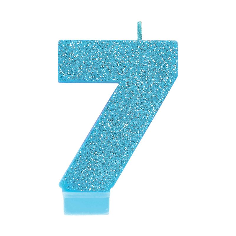 Blue glitter numeral candle shaped like the number 7, ideal for birthdays and celebrations, measuring 8cm in height.