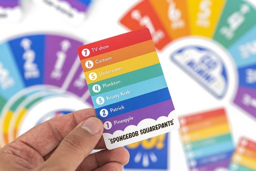 Colorful card game "Rainbow Go" featuring trivia clues for a fast-paced, fun-filled family competition.