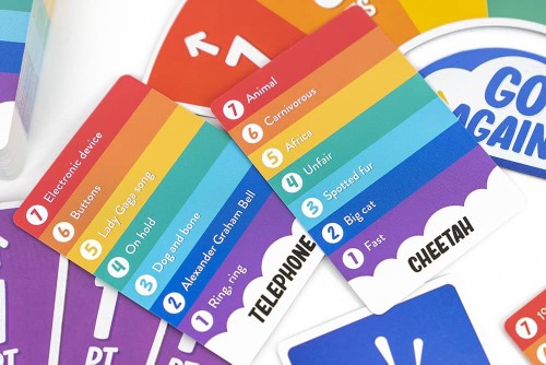 Colorful card game Rainbow Go, featuring trivia questions with clues, promoting fast play and strategic thinking for families and friends.