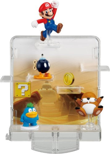 Colorful Super Mario figures set on a whimsical Desert Stage, featuring a spinning top for a fun balancing game for kids.