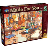 Detailed 1000pc jigsaw puzzle showcasing a luthier's workshop, perfect for craft and music enthusiasts.