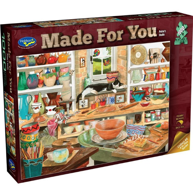 Charming 1000-piece puzzle depicting a potter's studio with a cat, featuring eco-friendly materials and vibrant details.