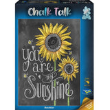 Vibrant 1000-piece puzzle titled 'Sunshine' featuring a cheerful chalkboard design for creative puzzling fun.