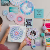 Spirograph Mandala Maker kit with frame, interchangeable wheels, stencils, and materials for creating intricate mandala designs.