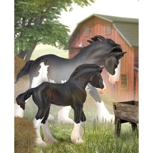 Hand-painted CollectA Clydesdale stallion figurine in black sabino with white spots, perfect for collectors and equine enthusiasts.