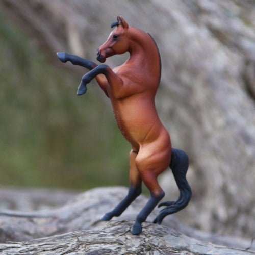 Majestic bay Arabian stallion figurine rearing gracefully, hand-painted details, durable non-toxic PVC, ideal for collectors.