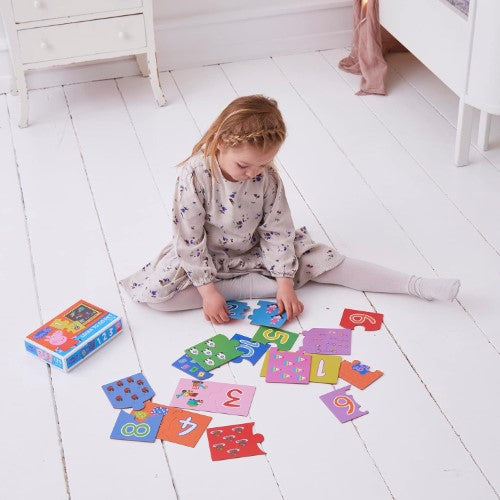 Colorful Peppa Pig counting puzzle for preschoolers, promoting number recognition and cognitive skills through play.