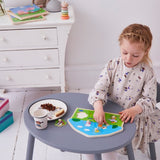 Colorful wooden peg puzzle featuring Peppa Pig characters, enhancing fine motor skills for toddlers aged 2 and up.