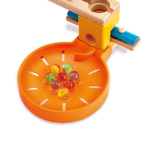 Colorful Hape Marble Catcher trays for Quadrilla marbles, designed for kids 4+, enhancing play and organization.