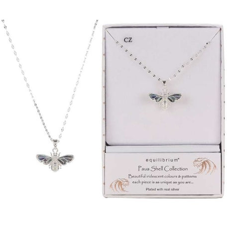 Elegant silver bee necklace with iridescent Paua shell wings, perfect for nature lovers and versatile for any outfit.