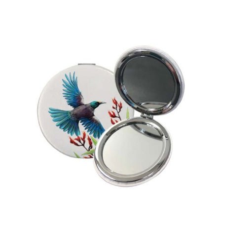 Sophie Blokker Kiwiana Compact Mirror featuring a Tui in flight, ideal for beauty routines and a stylish tribute to New Zealand wildlife.