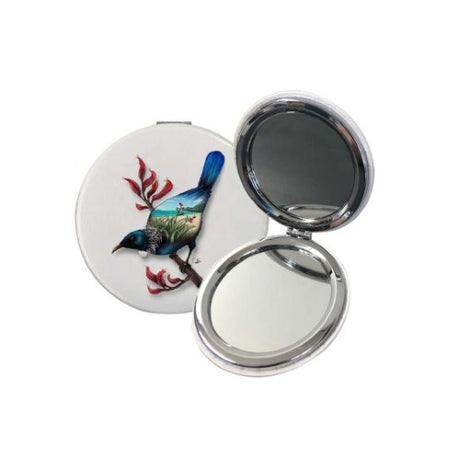 Sophie Blokker compact mirror featuring a tui design, perfect for touch-ups, travel, and showcasing Kiwi culture.