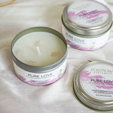 Pure Love Rose Candle: 80g rose-scented soy wax candle with Rose Quartz gemstones in a sleek metal tin, promoting love and tranquility.
