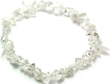 Set of 6 clear quartz bracelets, known as 'master healers', enhance energy and style with powerful healing properties.