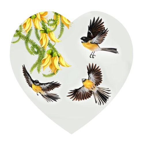 Heart-shaped ceramic wall hanging featuring flying fantails, adding Kiwiana charm to any space.