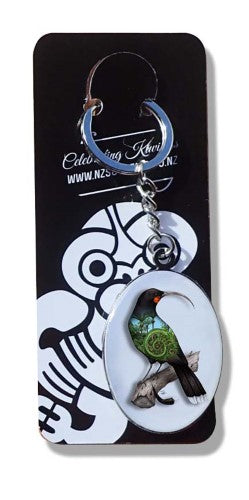 Kiwiana resin keyring featuring a vibrant Huia bird design, celebrating New Zealand's heritage and craftsmanship.