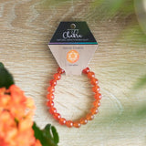 Sacral Chakra Carnelian Gemstone Bracelet featuring 8mm beads, promotes vitality, creativity, and emotional balance.