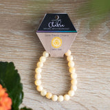 Elegant yellow jade gemstone bracelet designed for balancing the solar plexus chakra, promoting inner stability and well-being.