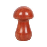 Polished red jasper mushroom sculpture, 3.5 cm tall, promoting wellbeing and harmony, elegantly packaged for gifting.