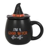 Whimsical coffee mug featuring a witch hat lid, perfect for adding magic to your morning brew routine.