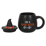 Whimsical coffee mug with witch hat lid, perfect for morning brews and adding magic to your routine.