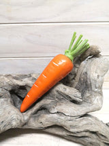 Vibrant artificial carrot designed for home decor, events, and photography with a lifelike appearance and easy maintenance.