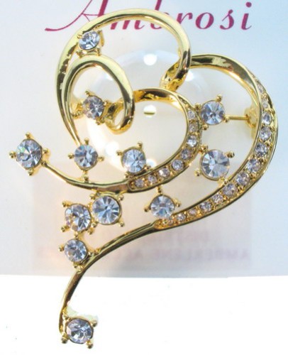 Elegant shiny gold brooch, perfect for adding sophistication to any outfit or occasion. Ideal for gifts and stylish statements.