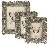 Elegant champagne-colored photo frame with large rose detailing, fitting photos 13 x 18 cm, perfect for displaying cherished memories.