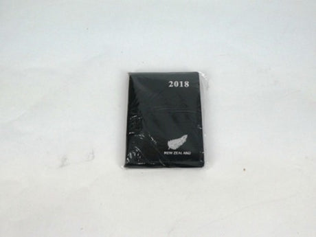 Compact black 2018 pocket diary with 96 pages for weekly planning and organization, ideal for professionals and students.