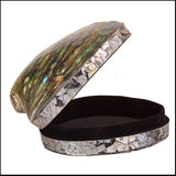 Iridescent paua shell jewellery box with soft satin lining, perfect for storing and showcasing your treasured items.