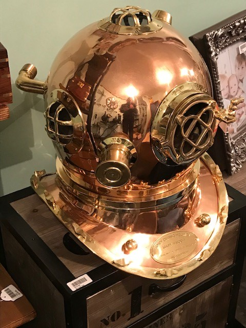 Full-size brass and copper diver's helmet replica, showcasing intricate detailing and a vintage finish, perfect for home decor.