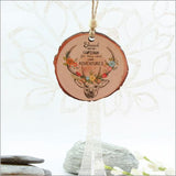 Wood slice ornament featuring a laser-cut Adventure Deer design, perfect for nature lovers and holiday decor.