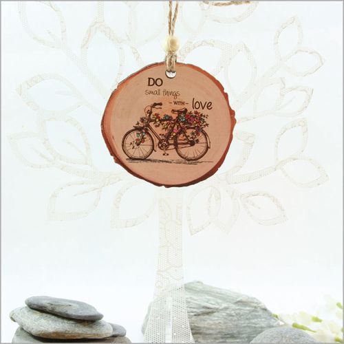 Wood slice ornament featuring a bicycle design, crafted from eco-friendly wood veneer, perfect for holiday decor and gifts.