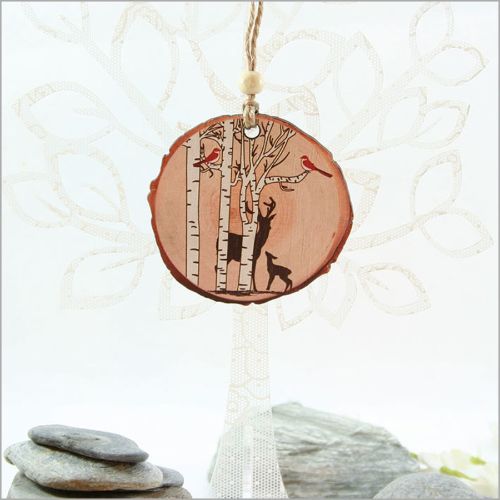 Wood Slice Ornament featuring a laser-cut deer among trees, perfect for rustic holiday decor and nature-inspired gifting.