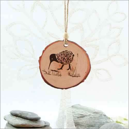 Filigree Kiwi Wood Slice Ornament made of durable wood veneer, featuring intricate designs for rustic holiday decor.