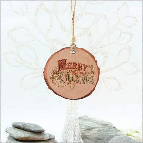 Vintage Merry Xmas wood slice ornament showcasing a rustic design, perfect for Christmas trees and holiday gifting.