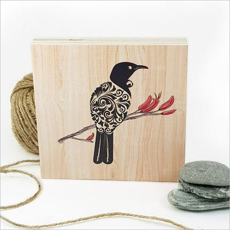 Kiwiana wall art featuring a filigree tui bird design on eco-friendly plywood, perfect for home decor or gifting.