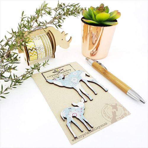Whimsical blue Bambi wall art featuring playful mini shapes, perfect for nurseries and children's rooms.