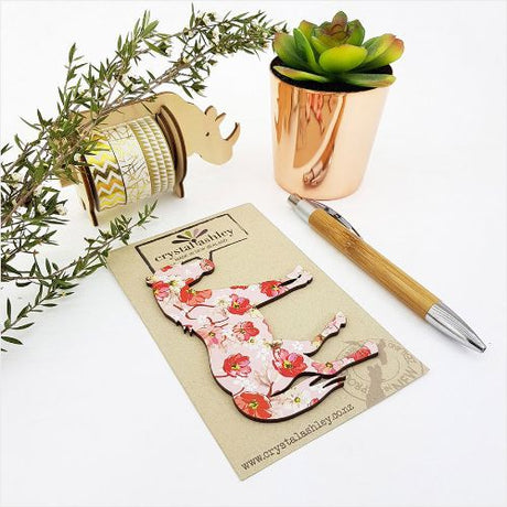 Decorative wall art featuring a pink floral horse design; perfect for children's rooms and equestrian-themed spaces.
