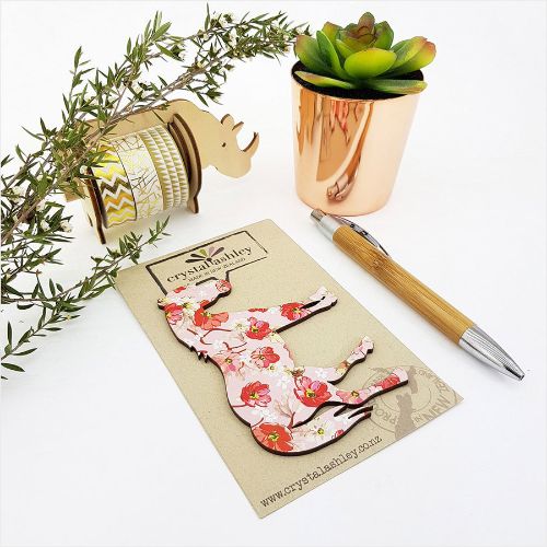 Decorative wall art featuring a pink floral horse design; perfect for children's rooms and equestrian-themed spaces.