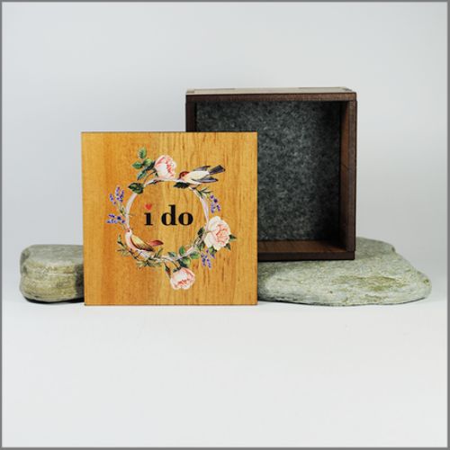 Small square trinket box with rose design and paua inlay, ideal for jewelry and keepsakes, measuring 80mm x 80mm x 40mm.